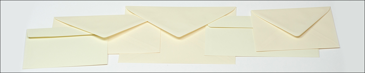 Elegant cream-colored envelopes in various sizes, such as DIN Long, C6, and C5